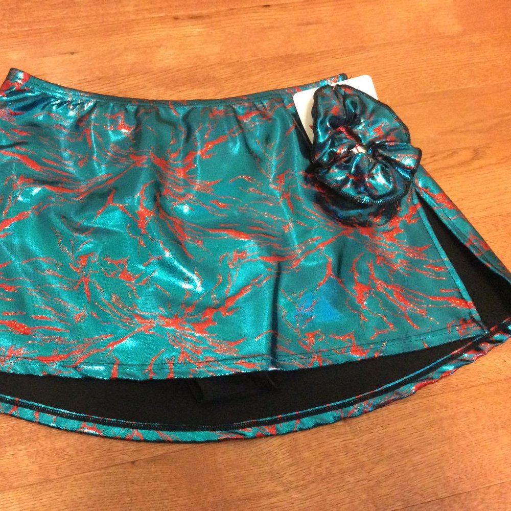 Mondor skating skirt 6321 red lightning pattern turquoise NWT Adult size XL